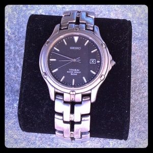 MENS SEIKO-TITANIUM-QUARTZ DRESS WATCH 7N32-0069